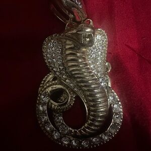 Luxurious Gold Cobra Pendant with gems rubies and cz’s